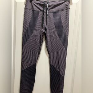 Nike womens leggings.  Epic lux tight fit.  Size-S.  Color-gray.  New with tags